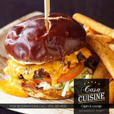 Cheeseburger: USDA-certified Prime ground beef  burger,  lettuce, tomato, onion, pickles, and your choice of aged white cheddar cheese.