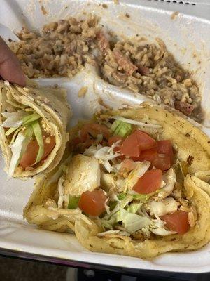 2 Halibut Tacos, on corn. When asked for FLOUR. No extra cheese, pretty sure I paid for it too.