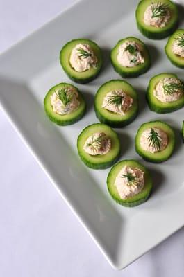 Smoked salmon in cucumber cups with fresh dill