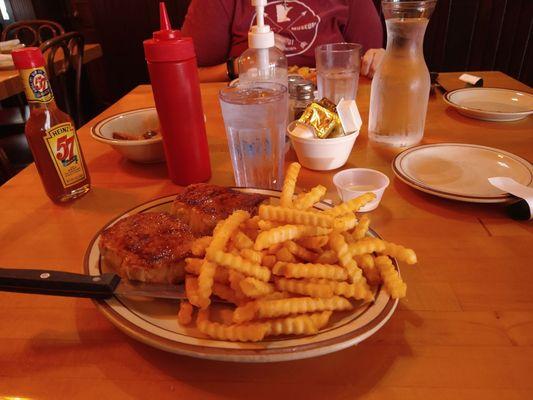 Pork chop dinner with french fries