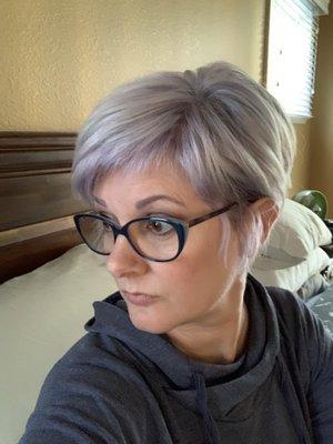 I had her highlight my roots to a white blond and then deposit a grey purple color on the roots only.