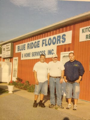 Owner Kurt (middle) with flooring installers.