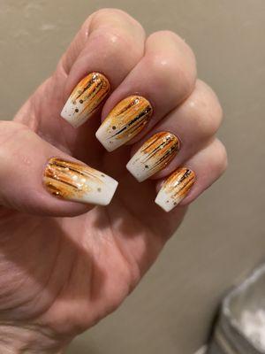 James outdid himself again!  My Thanksgiving nails!  This picture really doesn't do them justice...doesn't show the beautiful glitter.