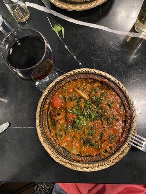 Shrimp, spinach, prunes, tomato and harissa tagine.