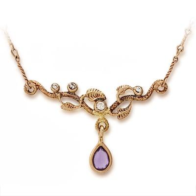 A lavender sapphire, hangs like an early morning dewdrop in this necklace. An M. Lowe & Company exclusive.