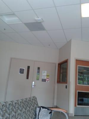 All I could do is take photos of er doors, waiting for someone to walk out of there