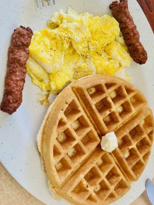 Scrambled eggs and waffle with turkey sausage