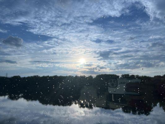 River view form the room, and reflection of the sky in the water