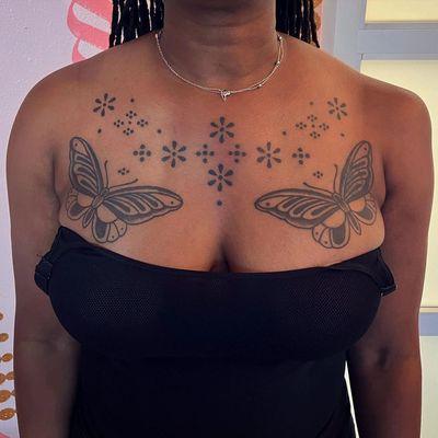 Ornamental chest tattoo by Kandace layne