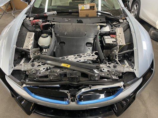 Before and after of a BMW i8 supercar.