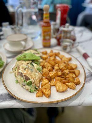 Veggie omelet with hash browns