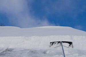 Raking snow from roofs helps prevent ice dam formation and also improves the efficiency of solar electric panels.