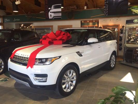 We went to buy my new car on my birthday and I showed up to my car in the showroom with a pretty bow on top!