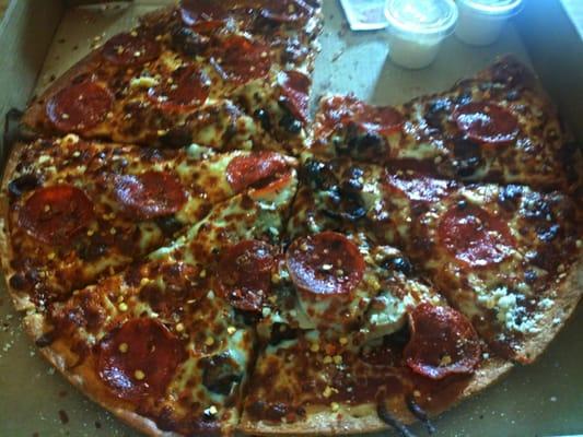 Pepperoni, Black Olive and Mushroom Pizza