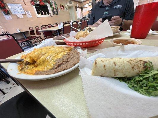 Enchilada plate and a side one taco