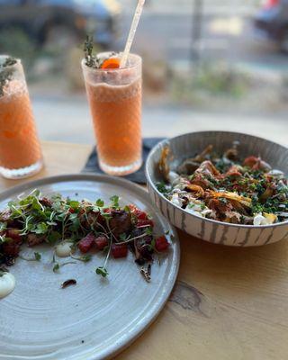 Pork belly appetizer along with the artichoke appetizer carrot cocktail