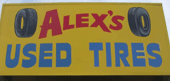 Alex's Used Tires logo