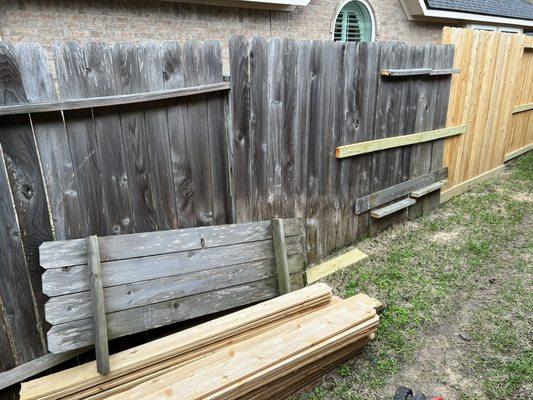 16 ft  of fence not done and wood pickets left to rot.