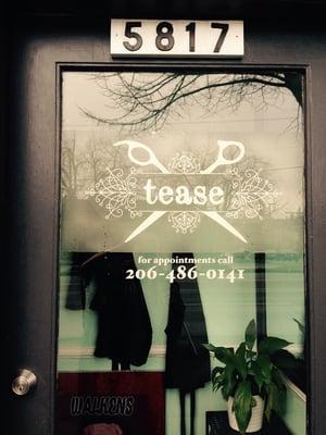 Entrance to Tease! Next door to Smitty's Barber Shop.