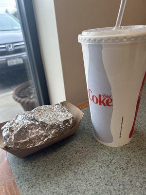 Breakfast bagel and a soda