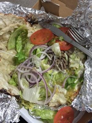 My gyro wedgie. Was disgusting. Notice the lack of meat & brown lettuce.