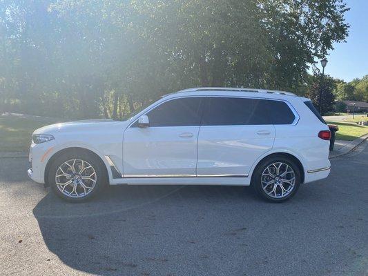 Newly tented BMW X7.