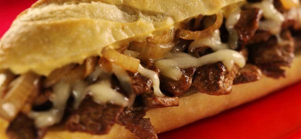 Philly Cheesesteak sandwich 
(The Philly Cheesesteak Sandwich contains beef, provolone cheese, mushrooms, onions, and green bell peppers.)