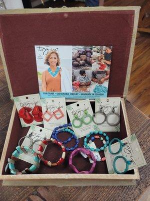 Tagua nut bracelets and earrings of varying colors