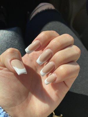 Coffin nails with white tips.