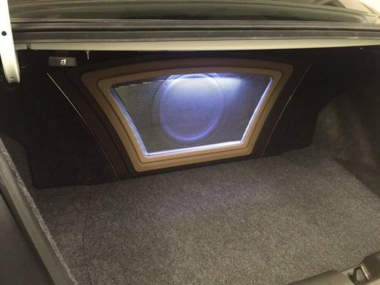 A med. subwoofer trunk build. Purposed for those whom want to enhance their music,  but do not want an unsightly basic "box" in the trunk.