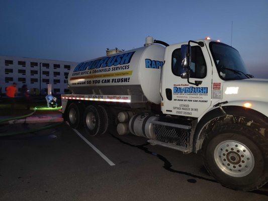 Pumping a grease trap at night for at a commercial property