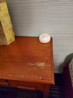 The fire alarm was on the night stand