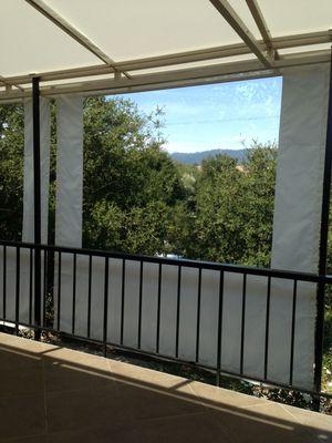 Drop curtain with clear vinyl window sewn in.