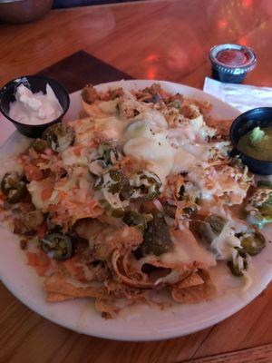 Smoked chicken nachos ($11) on Sundays or pork