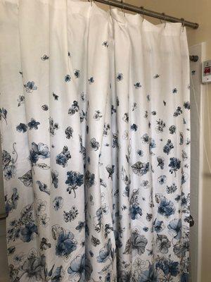 Mother specifically asked Gerard's "boys" to help her with the shower curtain because she was afraid she'd fall. They left it there.