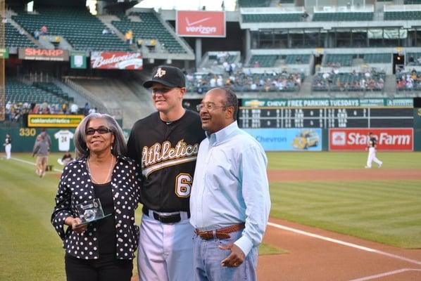 Presenting the Good Neighbor Award to my customer Chester Livingston at an Oakland A's game!