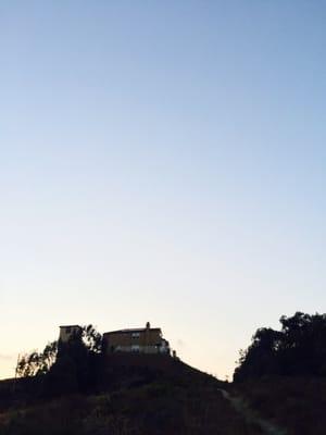 The Haunted House of Del Cerro at dusk.