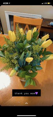 "Tiptoe through the tulips"  bouquet with yellow tulips instead of the red on the Website photo  ( medium price option )