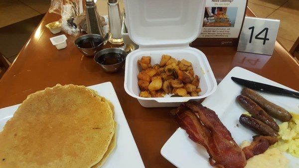 Bacon, cheese grits, potatoes, chicken sausage, eggs and side of pancakes. $17 ($2 each side, $6 for pancakes)