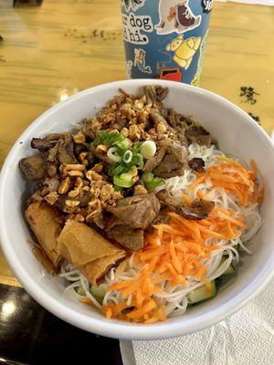 Rice vermicelli noodles with grilled pork and egg roll. Very tasty!