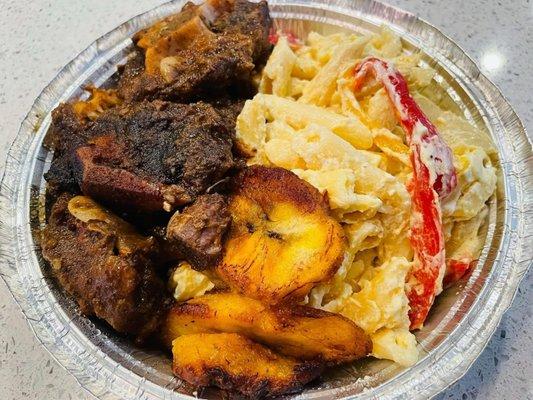 Oxtails with Rasta Pasta and Plantains