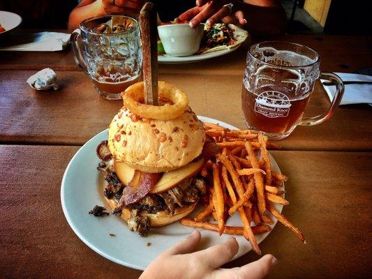 Beef Brisket on a burger with smoked Gouda, bacon and onion rings. Oh so yummy!