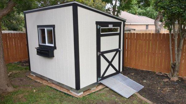 LEAN-TO 8X10 WITH WINDOW AND EXTRA LARGE DOOR.