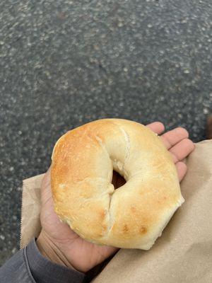 Plain bagel on my hand, for size comparison. (8 November 2023)