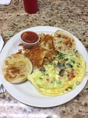 Veggie omelet with hashbrowns and English muffin