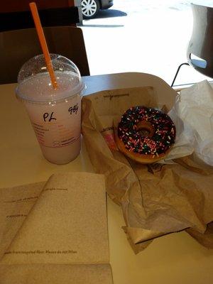 Chocolate frosted with sprinkles donut & pink lemonade coolatta