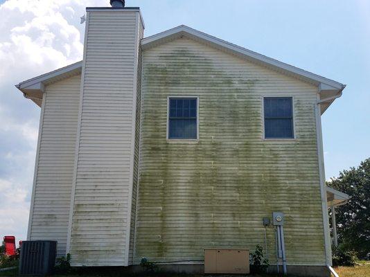 2 story house wash before - mold and mildew on the north side