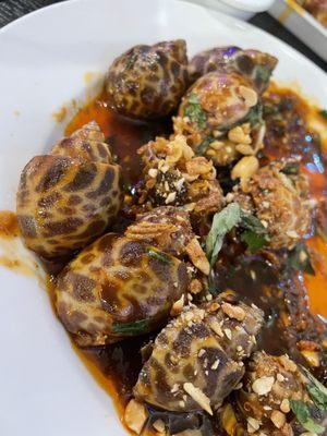 Snails tossed in sweet and sour sauce