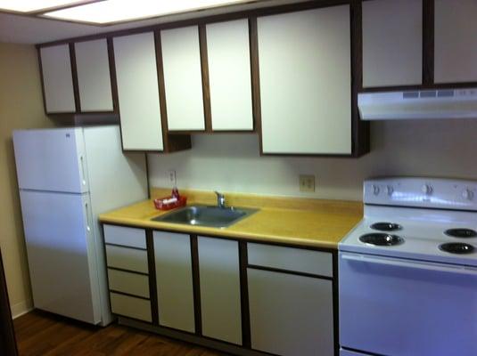 Kitchen with new appliances and flooring