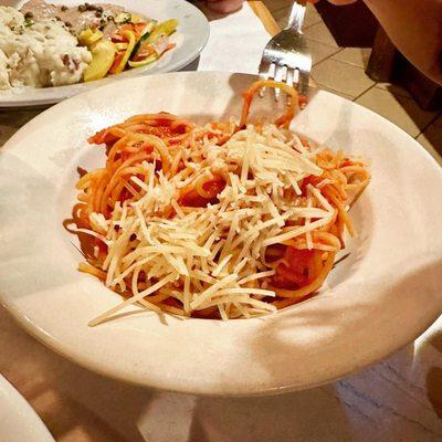 Kids spaghetti and meatballs in marinara